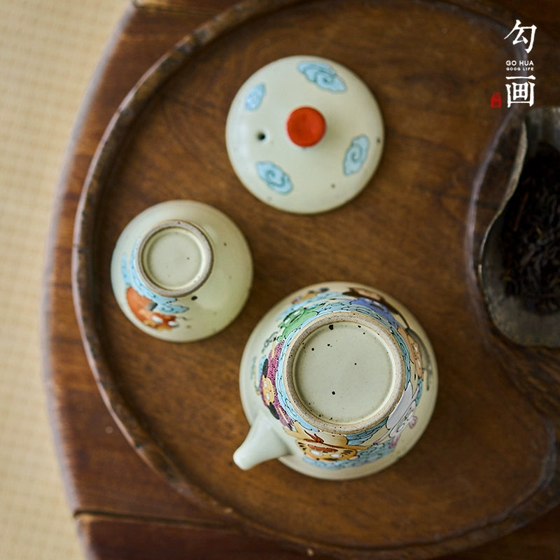 Sketch the original hand-painted zodiac travel tea set, a pot and a cup of Jingdezhen ceramics, a single tea teapot