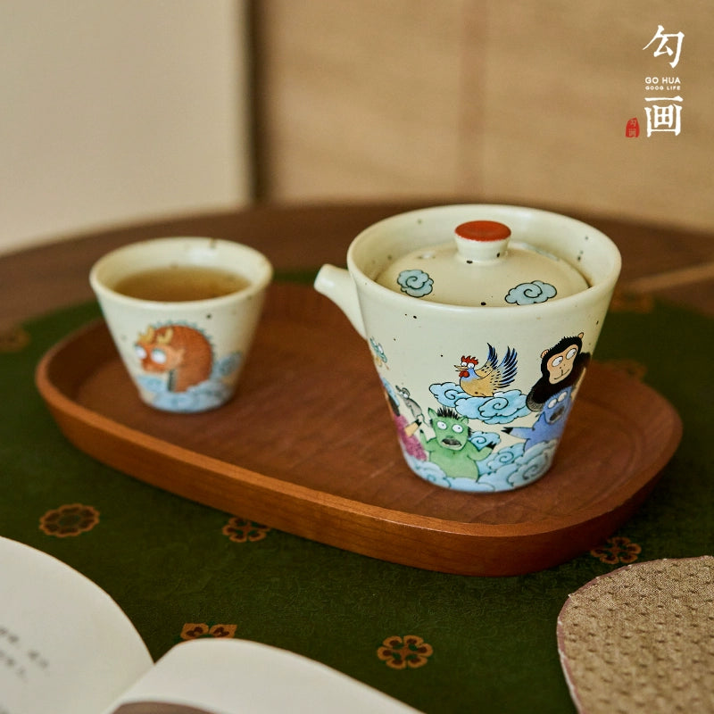 Sketch the original hand-painted zodiac travel tea set, a pot and a cup of Jingdezhen ceramics, a single tea teapot