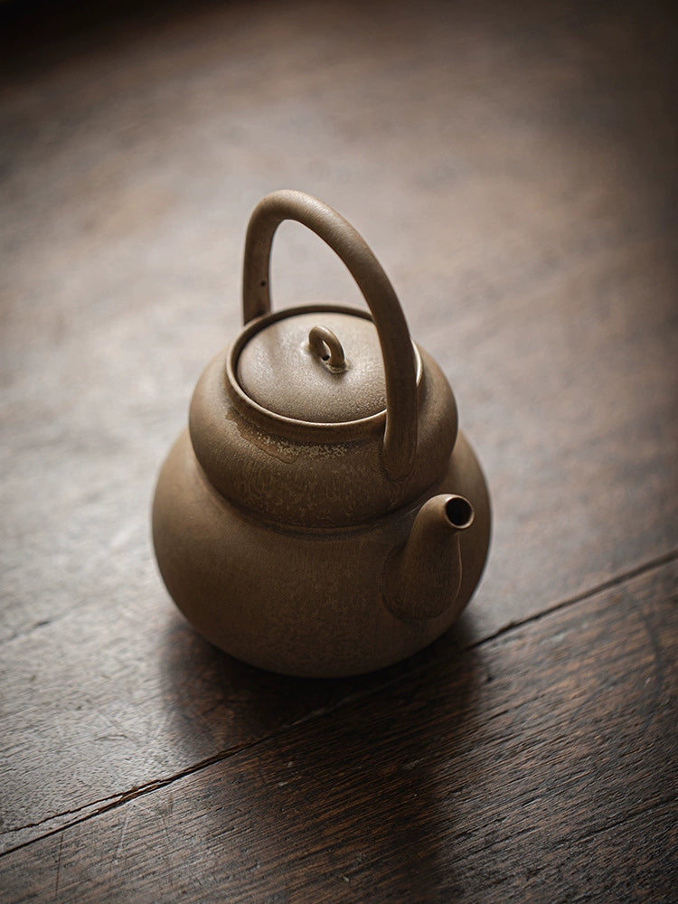 Cooking teapot around the hearth, Japanese style handle boiling teapot, high-grade kung fu tea set, boiling water, ceramic household retro anti-scald teapot