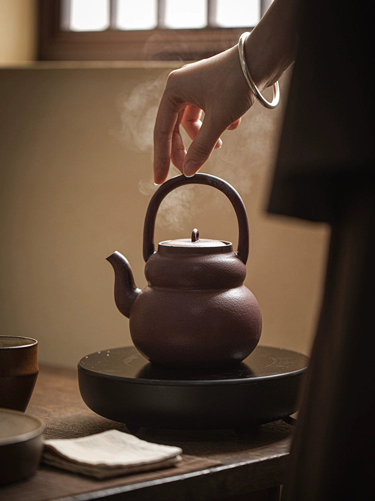 Cooking teapot around the hearth, Japanese style handle boiling teapot, high-grade kung fu tea set, boiling water, ceramic household retro anti-scald teapot