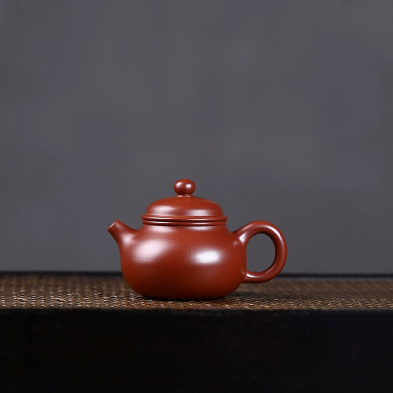 Yixing purple sand teapot, authentic raw ore, handmade Rongtian 100ML sketch kung fu teapot