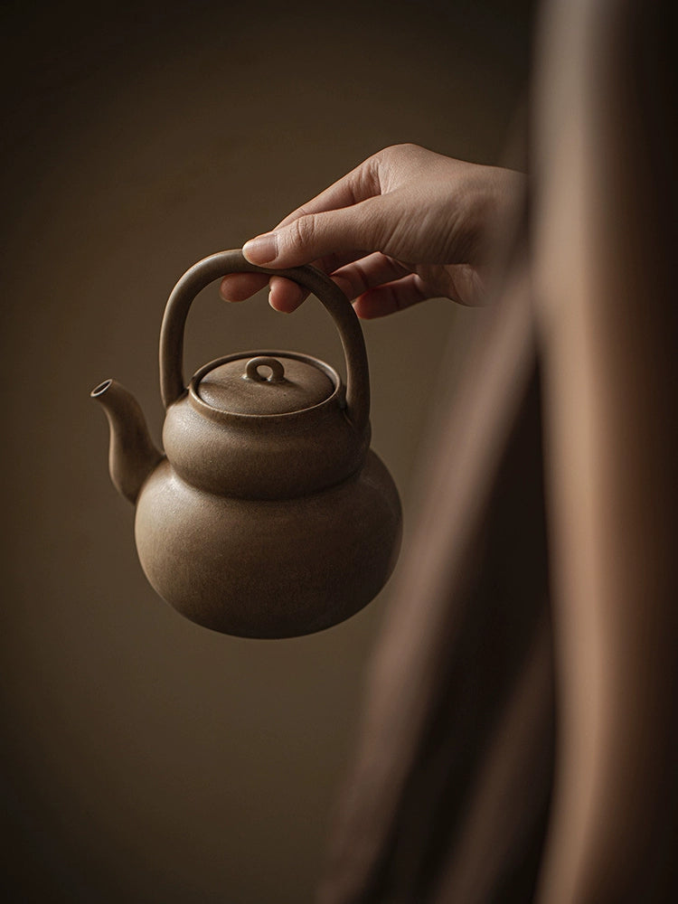 Cooking teapot around the hearth, Japanese style handle boiling teapot, high-grade kung fu tea set, boiling water, ceramic household retro anti-scald teapot