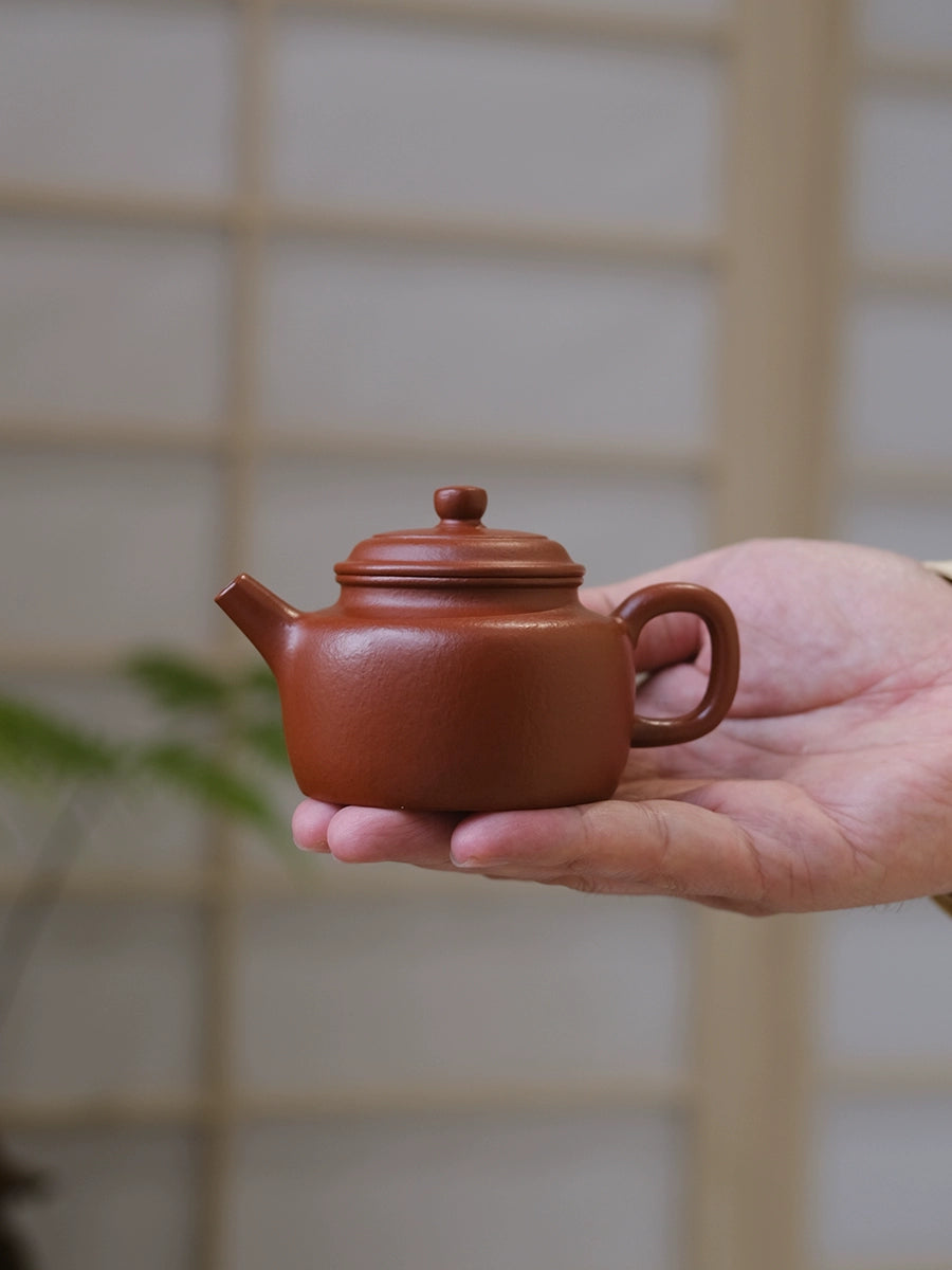 Xiaoqian Mountain House is handmade by Tycoon Dezhong purple clay pot, Yixing original mine, pear peel, vermilion mud teapot, tea making household tea set