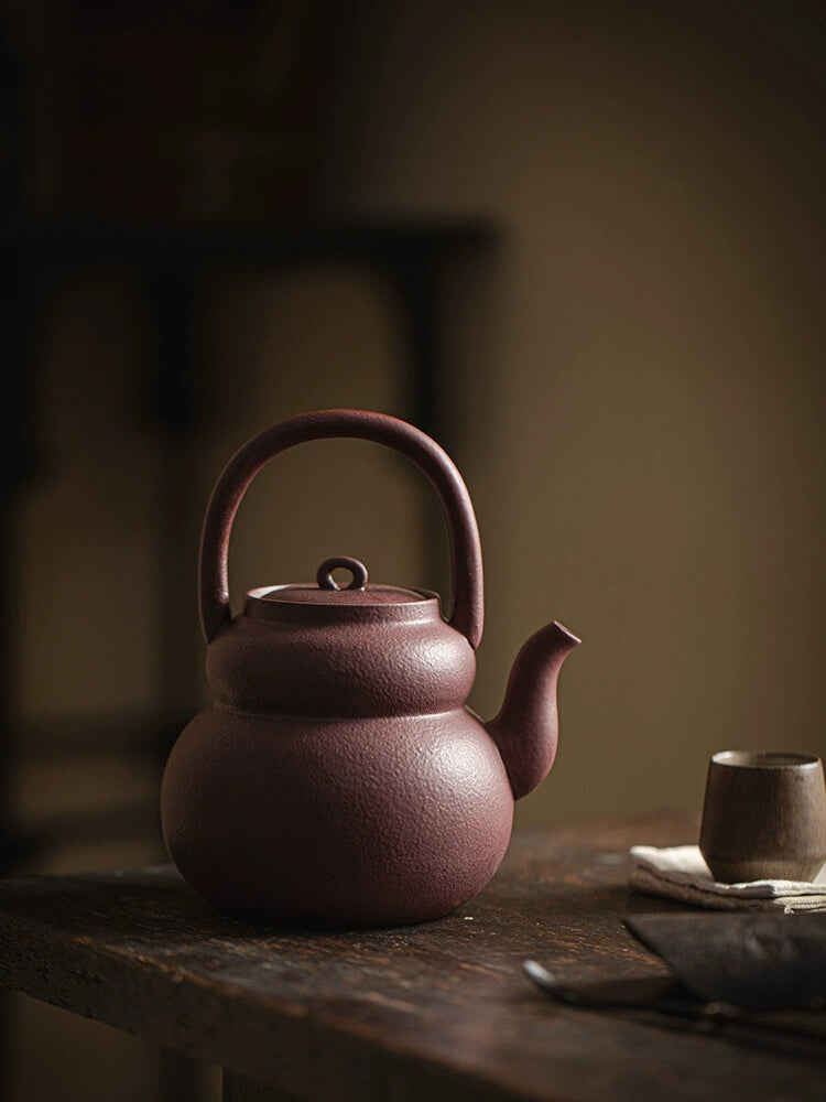 Cooking teapot around the hearth, Japanese style handle boiling teapot, high-grade kung fu tea set, boiling water, ceramic household retro anti-scald teapot